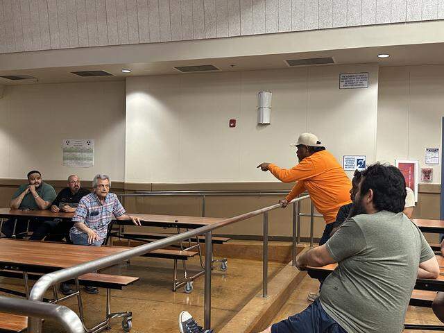 A resident of west Fresno yells at the architect for a 107-unit apartment project proposed for the intersection of McKinley and Valentine avenues, which would require the annexation of some land in the neighborhood into the city of Fresno